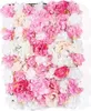 A close-up view of a wall of artificial flowers in various shades of pink and white. Produktbild-Vorschau