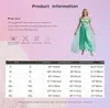 A woman is modeling a green costume, with a size chart and product information displayed next to her. Produktbild-Vorschau