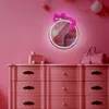 A pink dresser with a mirror and a handbag on top, in a pink room. Produktbild-Vorschau