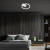A modern bedroom with a bed, nightstand, and a ceiling light. Produktbild-Vorschau