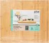 A bamboo hotplate cover is shown in its packaging, with a product image on the front. Anteprima dell’immagine prodotto