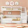 A white bunk bed with a trundle bed, decorated children's room. Náhľad obrázku produktu