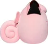 A side view of a pink plush toy. Voir les images du produit