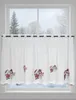 A white cafe curtain with a scalloped hem, featuring embroidered images of Santa Claus and snowmen, hanging in a window overlooking a snowy winter landscape. Produktbild-Vorschau