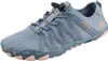 A single blue and pink athletic shoe is shown against a white background. Podgląd zdjęcia produktu