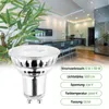A product shot of an LED bulb in front of a modern kitchen interior. Produktbild-Vorschau