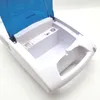 A close-up, top-down view of an open inhaler device. Produktbild-Vorschau