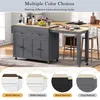 A kitchen island with an extendable table and stools, shown in a kitchen setting. Below are color options for the island. Voir les images du produit