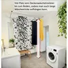 A laundry room with a ceiling-mounted clothes dryer, washing machine, and sink. Voir les images du produit