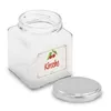 A clear glass jar with a label and a silver lid next to it, set against a white background. Produktbild-Vorschau