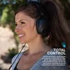 A woman wearing headphones outdoors. Náhled obrázku produktu