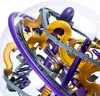 A close-up view of a complex spherical maze toy with multiple pathways and obstacles. Produktbild-Vorschau