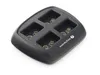 A black battery charger with four slots for batteries, set against a white background. Podgląd zdjęcia produktu