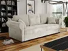 A living room scene with a sofa, bookshelf, and artwork. Náhled obrázku produktu