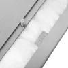 A close-up view of a metal component with engraved text. Voir les images du produit