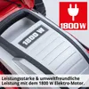 Close-up of the top of a red electric lawnmower with a silver panel showing '1800 W' and a red square with a plug icon and '1800 W'. Produktbild-Vorschau