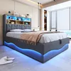 A modern bed with an integrated headboard shelf and blue LED lighting. Náhľad obrázku produktu