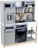 A toy kitchen set with various appliances and accessories. Produktbild-Vorschau