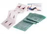 An open instruction booklet and a green exercise band are shown on a white background. Produktbild-Vorschau