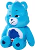 A blue plush toy bear sitting down. Produktbild-Vorschau