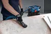 A person wearing gloves is using a Bosch wet/dry vacuum cleaner to clean a surface. Anteprima dell’immagine prodotto