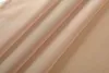 A close-up of draped fabric with soft folds. Produktbild-Vorschau