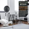 A modern living room or office space with a white stand fan, a desk, and a chair. Anteprima dell’immagine prodotto
