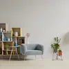 A living room scene with a chair and shelving unit. Náhľad obrázku produktu