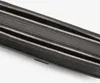 A close-up view of a black leather clutch bag with multiple zippers. Produktbild-Vorschau