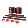 A set of dumbbell weights and bars on a white background. Produktbild-Vorschau