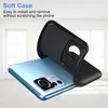 A black phone case is being shown being put onto a blue smartphone. Náhľad obrázku produktu