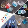 A collage of various resin casting molds and finished resin pieces, including geometric shapes, spheres, and decorative items with embedded flowers and glitter. Produktbild-Vorschau
