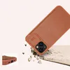 A brown phone case is shown falling onto a broken surface, highlighting its protective qualities. Podgląd zdjęcia produktu