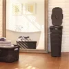 A bathroom scene with laundry baskets and towels. Produktbild-Vorschau