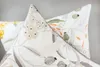 Close-up view of two floral patterned pillow covers. Produktbild-Vorschau