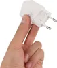 A hand is holding a white USB charger adapter. Produktbild-Vorschau