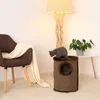 A cozy living room scene with a cat tree, a chair with a blanket, and a floor lamp. Podgląd zdjęcia produktu