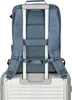 The back of a blue backpack is shown attached to a silver suitcase. Produktbild-Vorschau