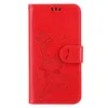 A red phone case with embossed lotus flowers and dragonflies. Produktbild-Vorschau