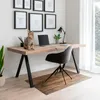 A home office setup with a desk, chair, laptop, and a cat sitting on the desk. Produktbild-Vorschau
