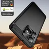 A black smartphone case with a carbon fiber texture is shown at an angle, resting on a textured brown surface. Produktbild-Vorschau