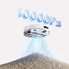 A white robot vacuum cleaner is shown from underneath, hovering over a pile of debris, with blue lines indicating suction power. Anteprima dell’immagine prodotto