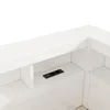 A close-up view of a white shelf with a black electrical outlet featuring two sockets and two USB ports. Náhľad obrázku produktu
