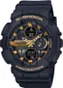 A close-up studio shot of a black and gold G-Shock watch. Voir les images du produit