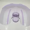 A close-up, top-down view of the interior of a white and purple foot bath. Náhľad obrázku produktu