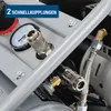 A close-up view of the connectors and pressure gauge on an air compressor. Produktbild-Vorschau