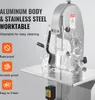 A commercial electric meat band saw with water splashing on it, highlighting its features. Náhled obrázku produktu