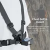 A person wearing a chest harness with a GoPro attached, with a rock climber in the background. Náhľad obrázku produktu