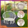 A macrame hammock chair hanging outdoors, with close-up insets showing details of the weaving and knotting. Produktbild-Vorschau