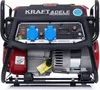 A close-up view of the control panel and engine of a portable generator. Produktbild-Vorschau